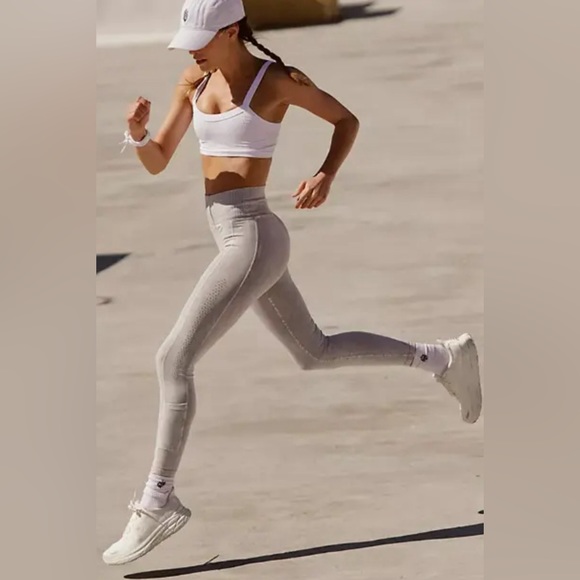 Free People Pants - 85-FPMovement High-Rise 7/8 Good Karma 2-Pocket Leggings has imperfection